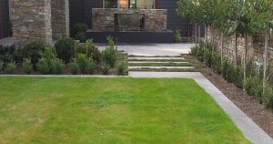 A inspiring landscaping design with stone waterfall fountain