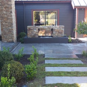 Polished Concrete with Gardens and water feature landscaping