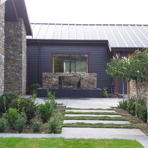 A inspiring landscaping design with stone waterfall fountain